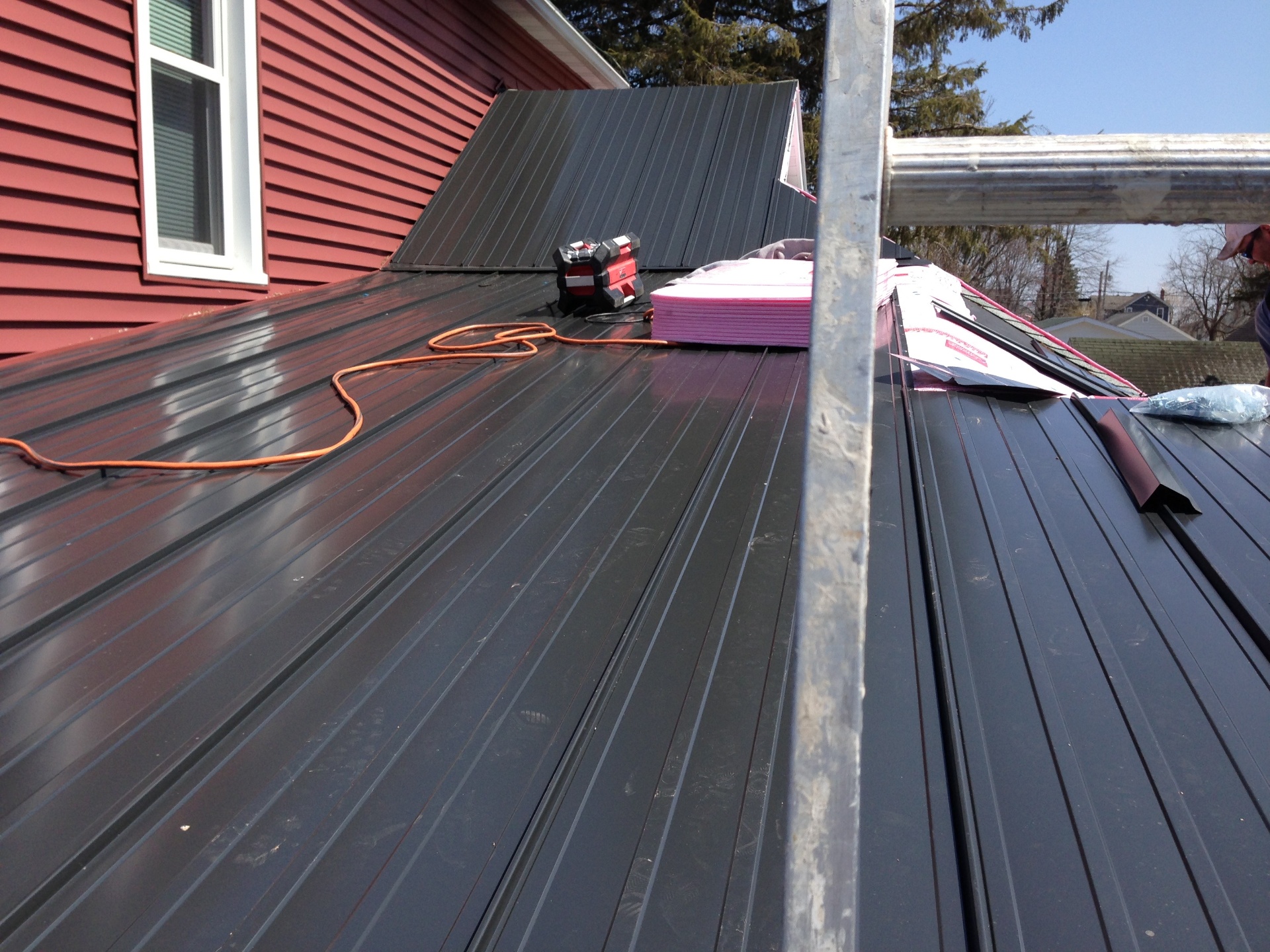 Standing seam metal roof panels installed on a Northwest Illinois home